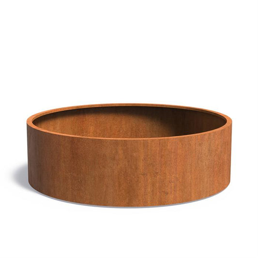 Ronde plantenbak cortenstaal van 200cm doorsnee en 60cm hoog.